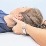 Physical therapist working on neck trigger point